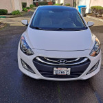 Front view of a 2013 Hyundai Elantra GT in excellent condition, white exterior, available for sale